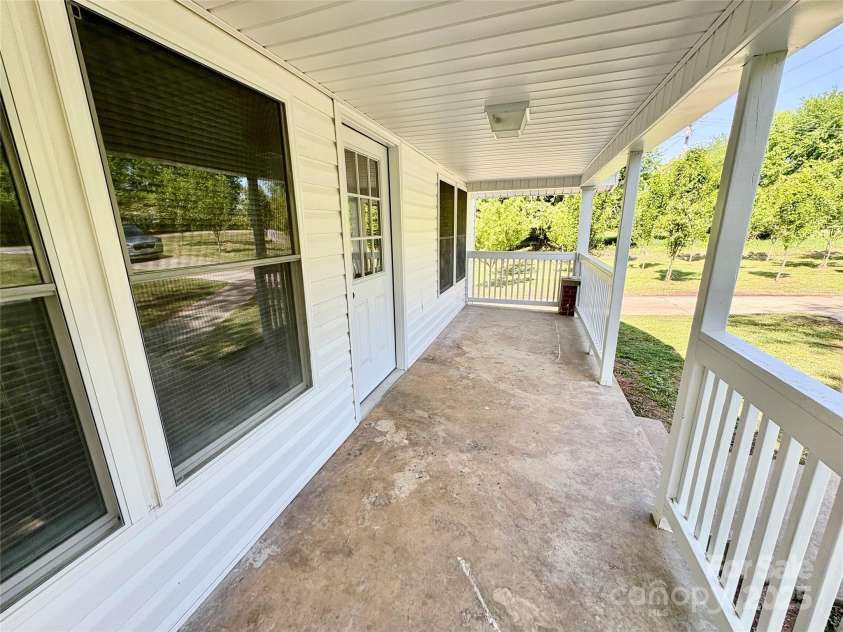 2724 Peachtree Road, Statesville, NC 28625.  MLS# CAR4248826, YatesRealty ID 6676. Rocking chair front porch!