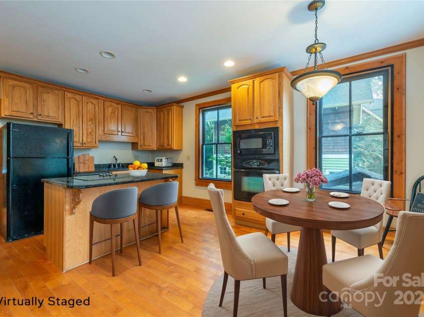 14 Harrison Street, Asheville, NC 28801.  MLS# CAR4181067, YatesRealty ID 6677. Simple and functional- virtually staged