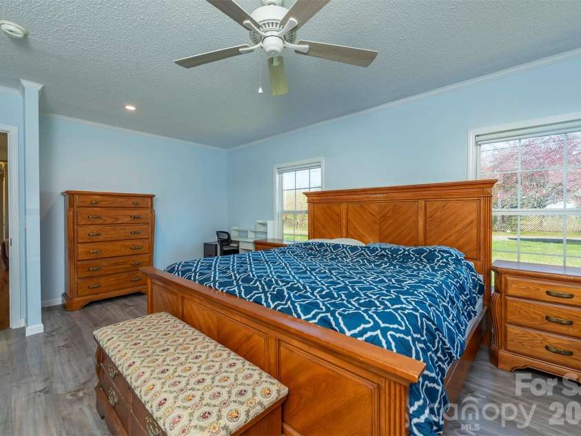 181 High Valley Estates Drive, Alexander, NC 28701.  MLS# CAR4360739, YatesRealty ID 6678. Spacious primary bedroom