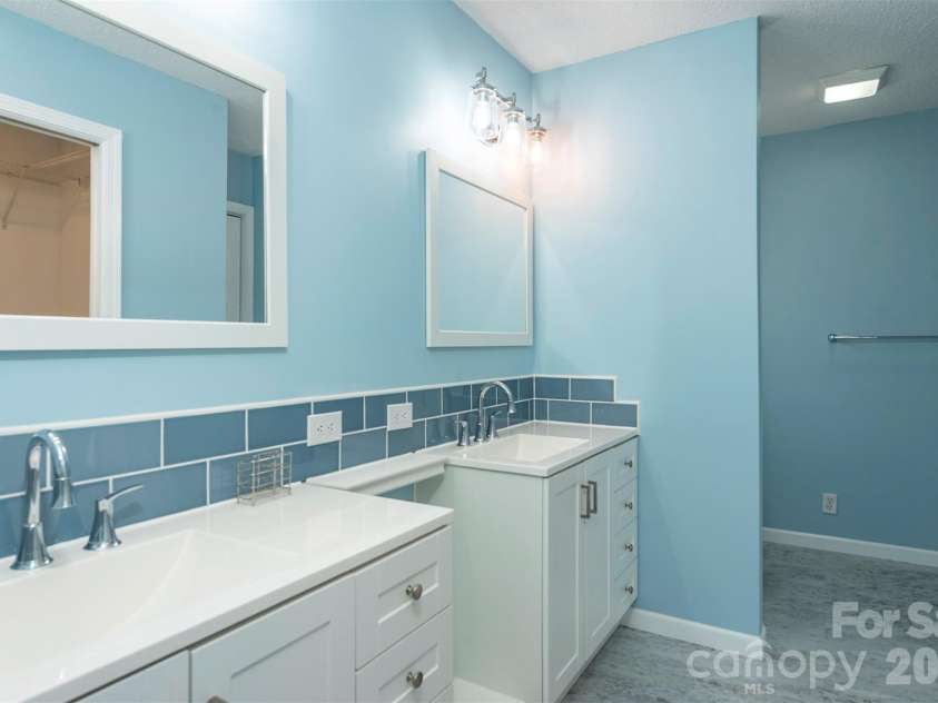 181 High Valley Estates Drive, Alexander, NC 28701.  MLS# CAR4360739, YatesRealty ID 6678. Updated primary bathroom