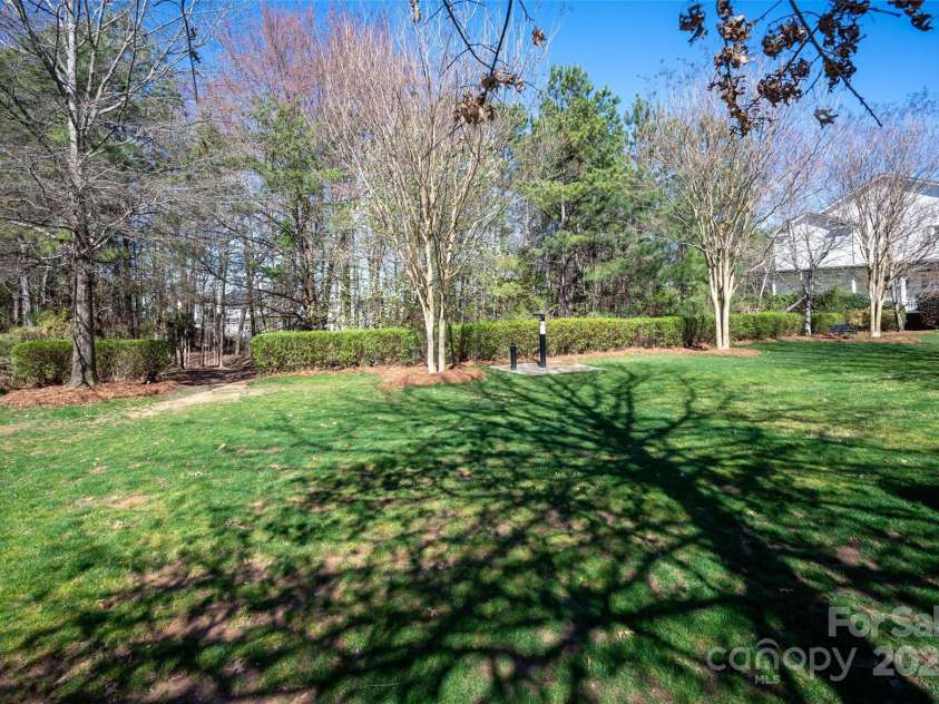 875 Stratford Run Drive, Fort Mill, SC 29708.  MLS# CAR4229364, YatesRealty ID 6682. Across the street from an open pocket park