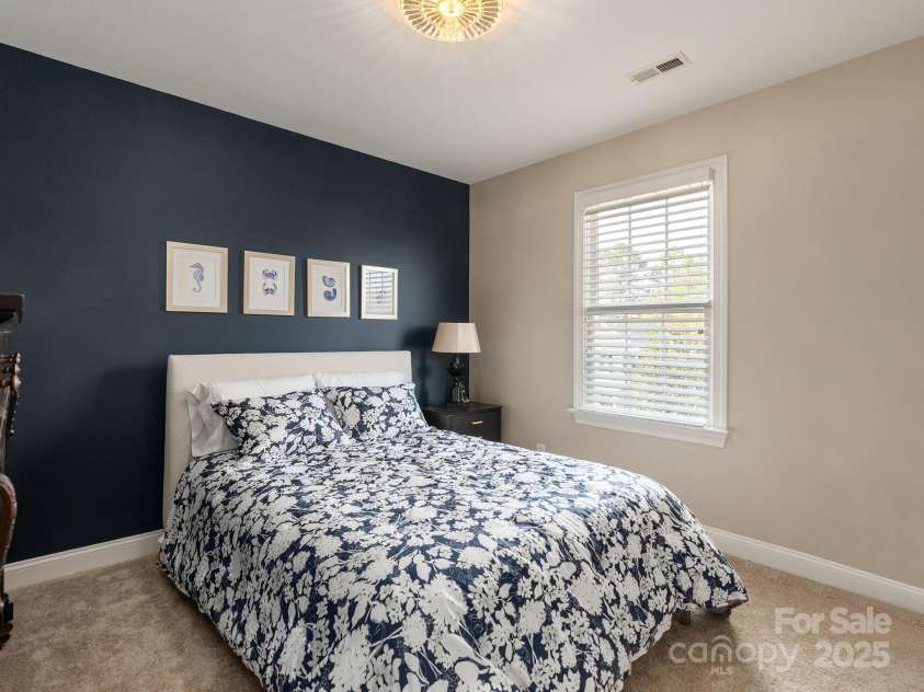 875 Stratford Run Drive, Fort Mill, SC 29708.  MLS# CAR4229364, YatesRealty ID 6682. One of three secondary bedrooms- with CUSTOM closet