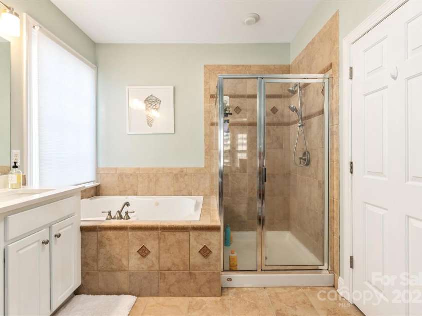 875 Stratford Run Drive, Fort Mill, SC 29708.  MLS# CAR4229364, YatesRealty ID 6682. Owner's bathroom
