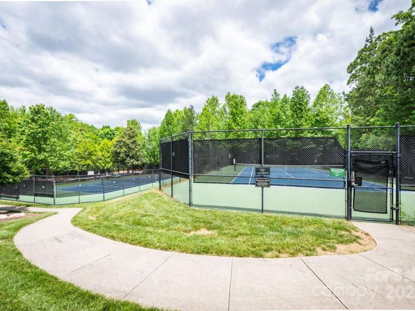 875 Stratford Run Drive, Fort Mill, SC 29708.  MLS# CAR4229364, YatesRealty ID 6682. Two tennis courts