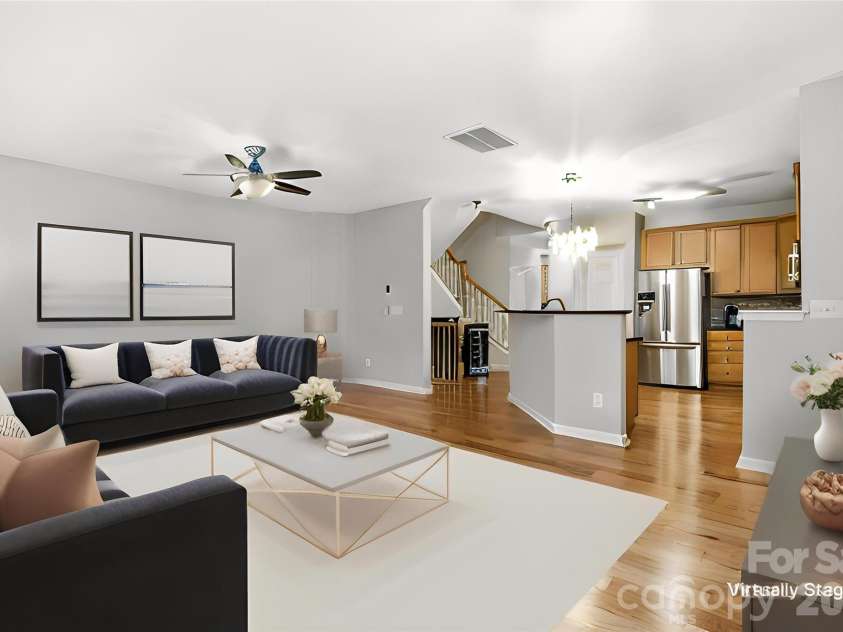 19105 Chandlers Landing Drive, Cornelius, NC 28031.  MLS# CAR4327884, YatesRealty ID 6685. Virtually staged.... Living room.