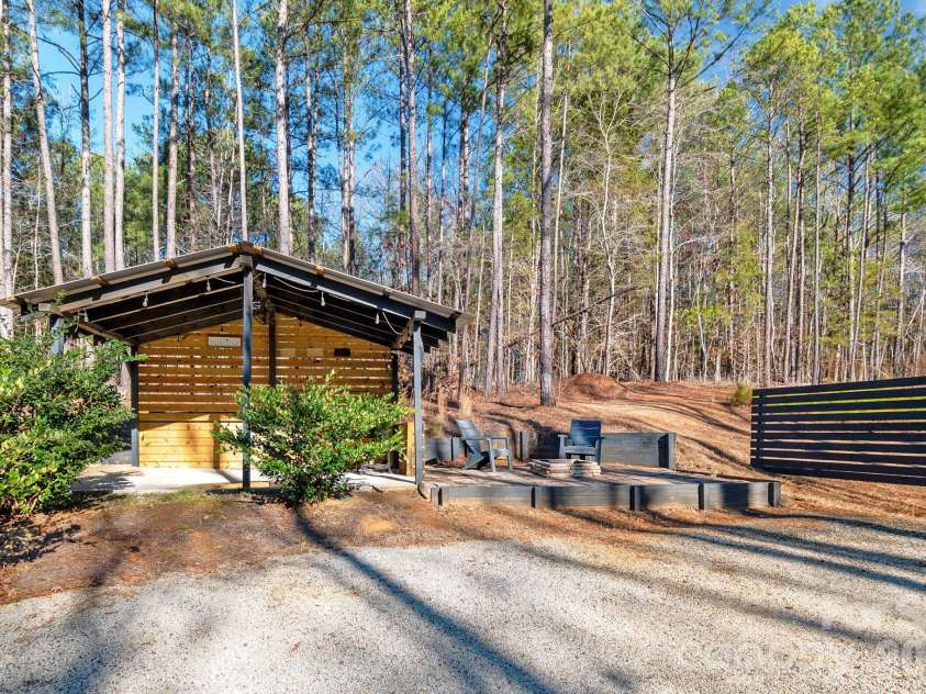 619 Hubbard Drive, Lancaster, SC 29720.  MLS# CAR4341417, YatesRealty ID 6686. Covered Patio & Firepit