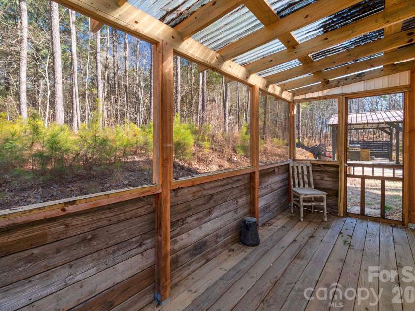 619 Hubbard Drive, Lancaster, SC 29720.  MLS# CAR4341417, YatesRealty ID 6686. Side Screened Porch