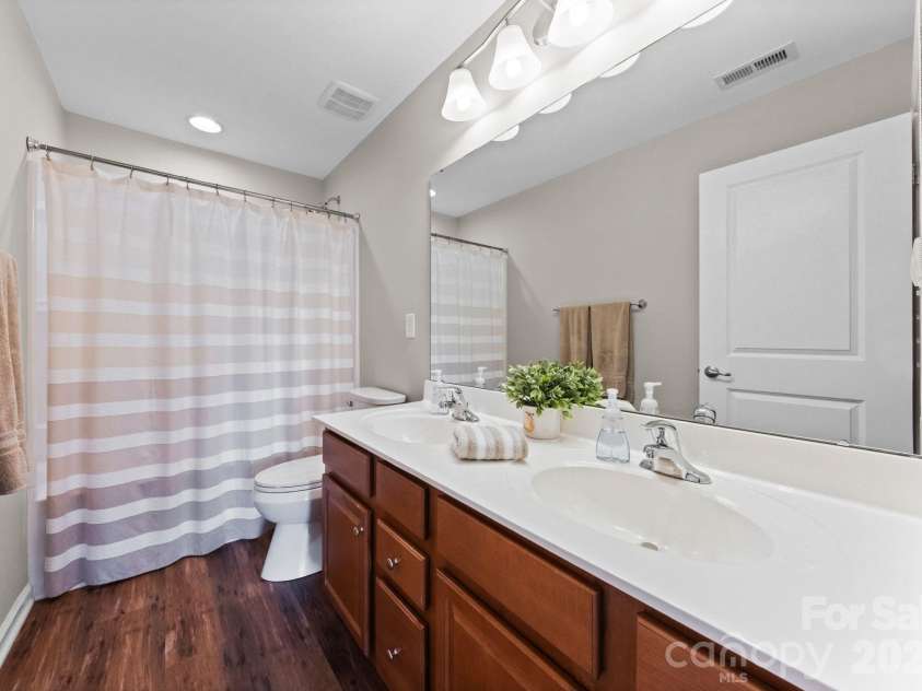 788 Rosegate Drive, Gastonia, NC 28056.  MLS# CAR4354667, YatesRealty ID 6689. Guest bathroom on upper level