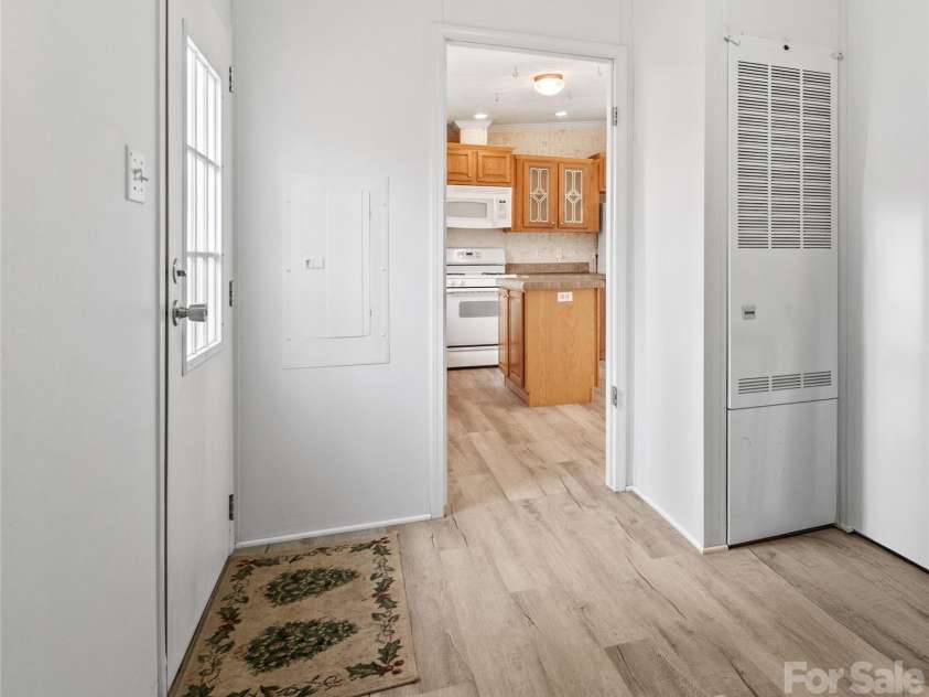 238 Cherry Hollow, Burnsville, NC 28714.  MLS# CAR4327901, YatesRealty ID 6698. Laundry/Mud 