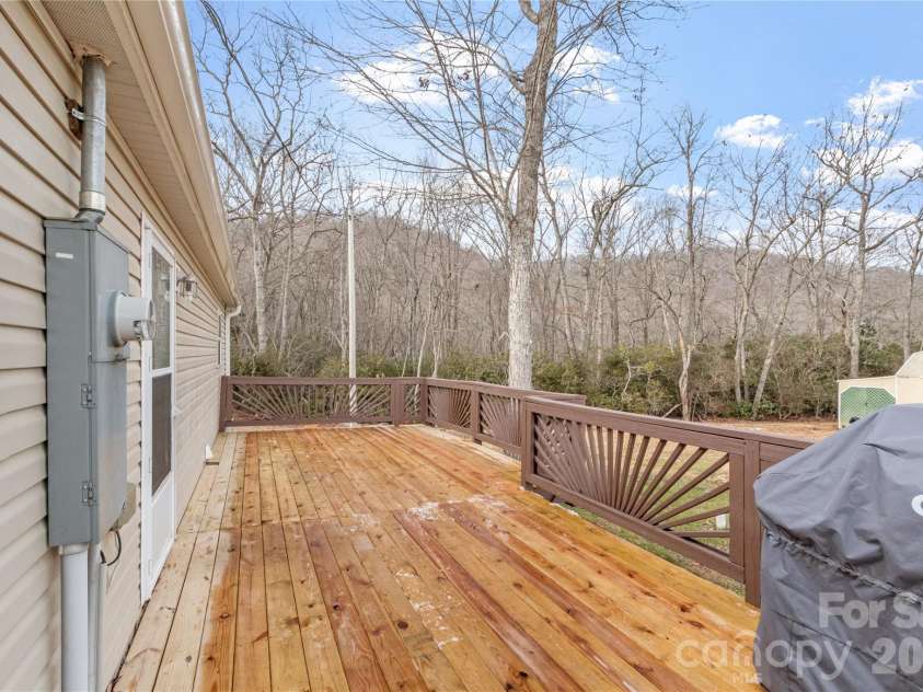 238 Cherry Hollow, Burnsville, NC 28714.  MLS# CAR4327901, YatesRealty ID 6698. Rear deck