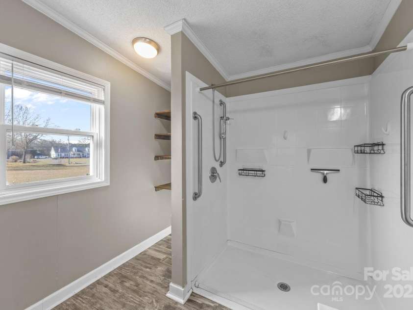 21465 Old Beatty Ford Road, Gold Hill, NC 28071.  MLS# CAR4326908, YatesRealty ID 670. Handicap accessible primary en-suite shower