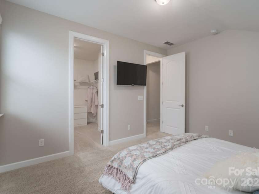 1501 Liberty Row Drive, Fort Mill, SC 29708.  MLS# CAR4196570, YatesRealty ID 6704. Upper Level Guest Bedroom w/walk in Closet