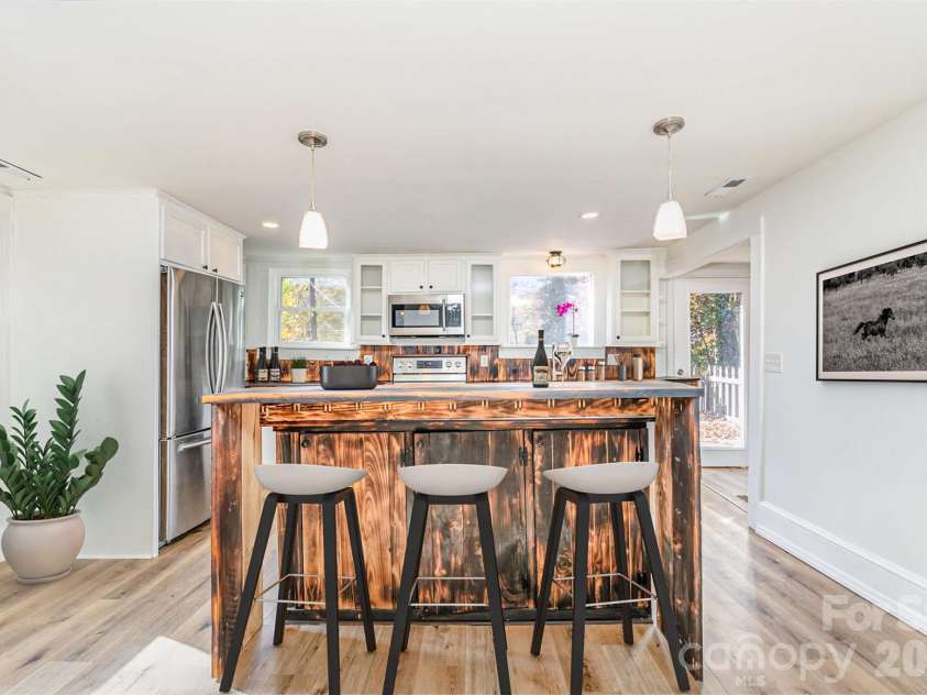 243 Boys Camp Road, Lake Lure, NC 28746.  MLS# CAR4379056, YatesRealty ID 6705. Virtually staged kitchen