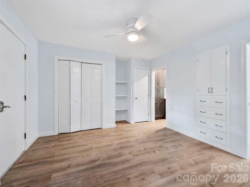 130 Old Mill Road, Flat Rock, NC 28731.  MLS# CAR4335418, YatesRealty ID 6706. Bedroom with built ins