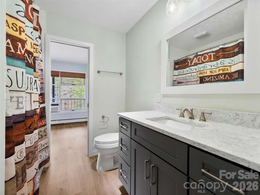 130 Old Mill Road, Flat Rock, NC 28731.  MLS# CAR4335418, YatesRealty ID 6706. Updated Bathroom