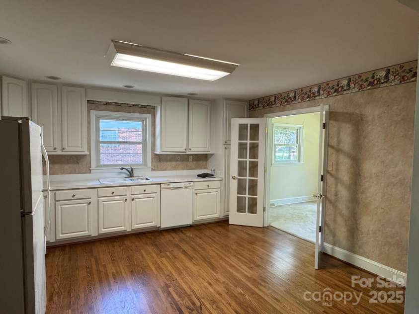 5119 Beckford Drive, Charlotte, NC 28226.  MLS# CAR4247630, YatesRealty ID 6706. French doors to the formal dining area