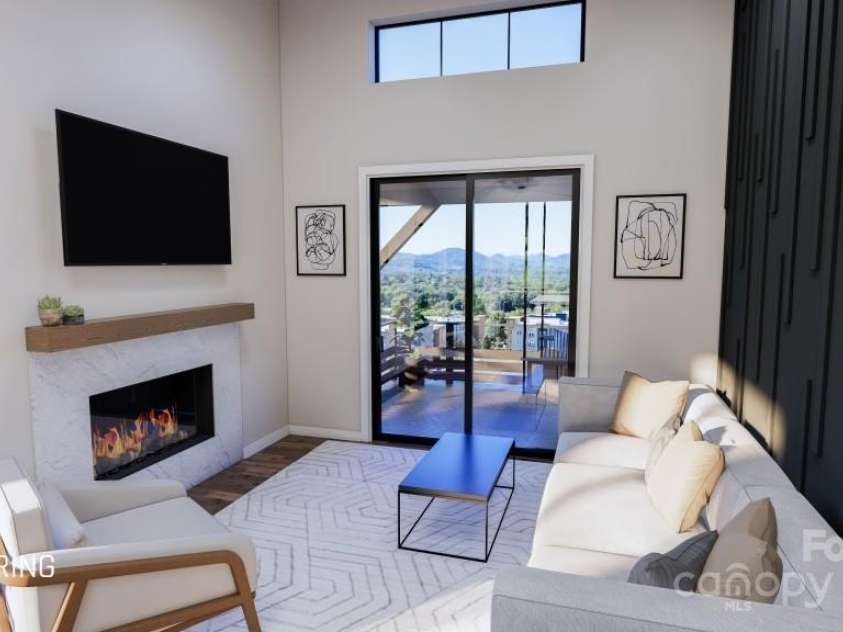 602 Storybook Villas Trail, Asheville, NC 28804.  MLS# CAR4211329, YatesRealty ID 671. Living area with high ceilings and extra windows for light