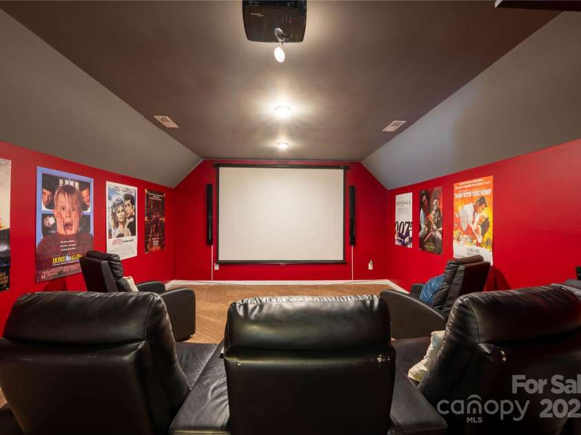 4607 Bonroi Avenue, Charlotte, NC 28213.  MLS# CAR4248280, YatesRealty ID 6713. A movie buffs delight!  This large bonus room has been converted into the state of the art movie room with surround sound and theater lighting.  Invite friends over and have game night or watch your favorite movie!  This