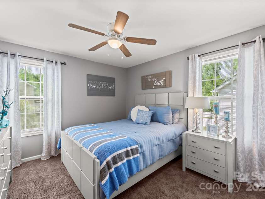 4607 Bonroi Avenue, Charlotte, NC 28213.  MLS# CAR4248280, YatesRealty ID 6713. Bedroom #5 gets plenty of natural light in the afternoons.  This bedroom overlooks the back yard, has lots of room to move around and has plenty of closet space.