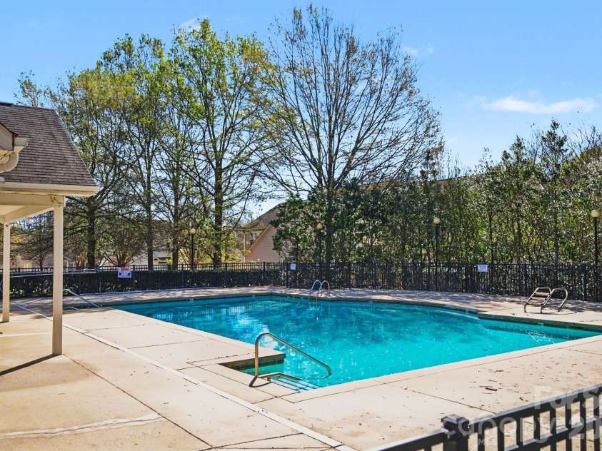 8411 Chaceview Court, Charlotte, NC 28269.  MLS# CAR4357528, YatesRealty ID 6714. Community pool