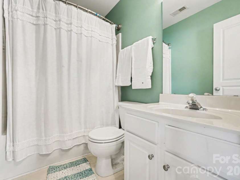 8411 Chaceview Court, Charlotte, NC 28269.  MLS# CAR4357528, YatesRealty ID 6714. Hallway Bathroom