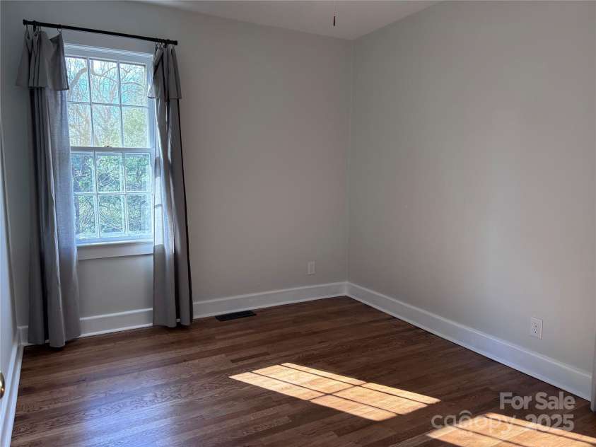1307 Hyman Avenue, Hendersonville, NC 28792.  MLS# CAR4208395, YatesRealty ID 6717. Hall bedroom 1