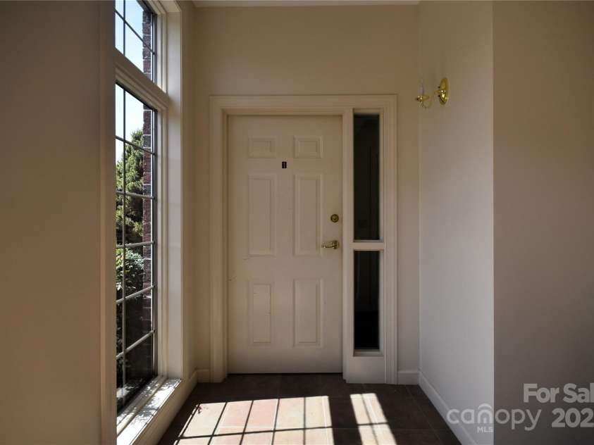 1465 Lakeshore Drive, Lake Junaluska, NC 28745.  MLS# CAR4241978, YatesRealty ID 6718. Inside the entry door, in the common area foyer.