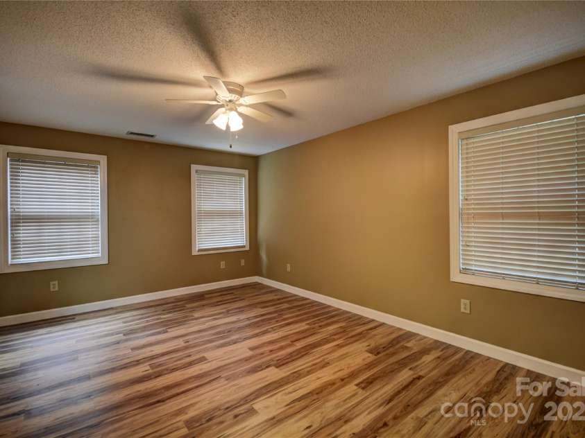 1465 Lakeshore Drive, Lake Junaluska, NC 28745.  MLS# CAR4241978, YatesRealty ID 6718. Primary Bedroom with lots of natural light