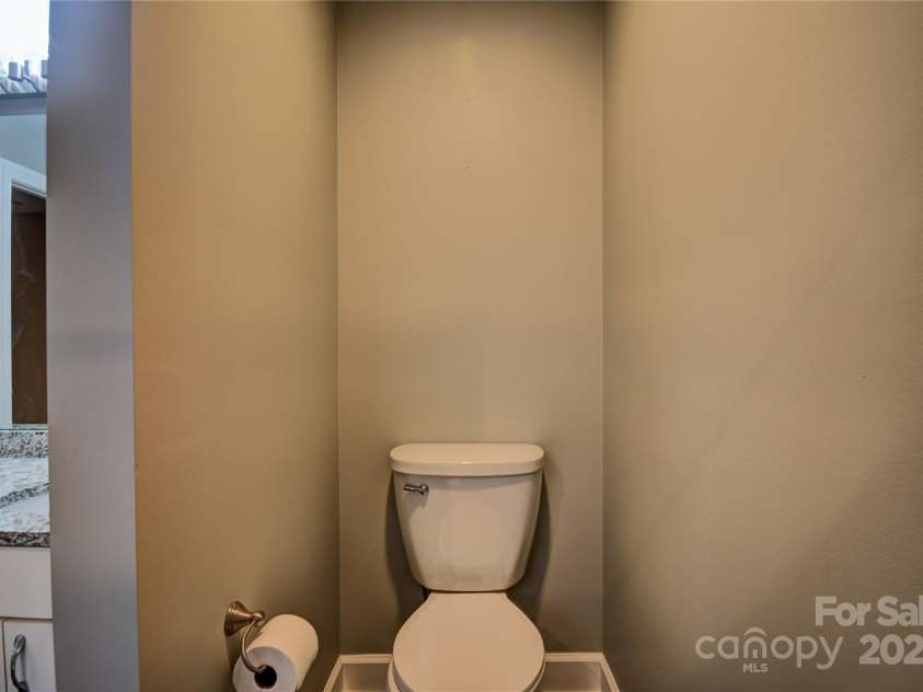 1465 Lakeshore Drive, Lake Junaluska, NC 28745.  MLS# CAR4241978, YatesRealty ID 6718. Toilet Area in the primary bathroom
