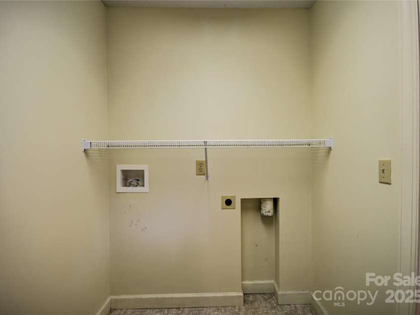 1465 Lakeshore Drive, Lake Junaluska, NC 28745.  MLS# CAR4241978, YatesRealty ID 6718. Washer and dryer hookups in the laundry room