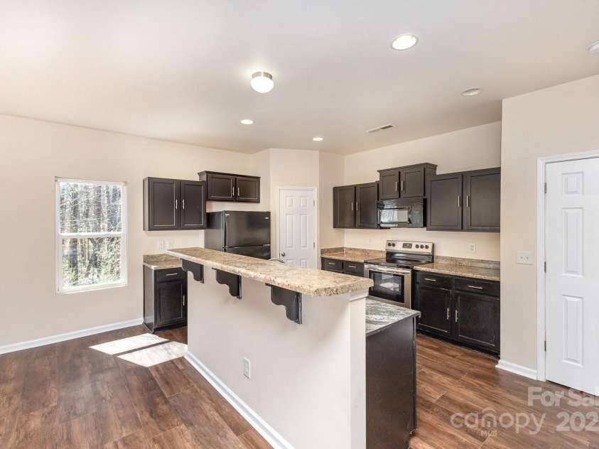 6204 Springbeauty Drive, Charlotte, NC 28227.  MLS# CAR4209429, YatesRealty ID 6727. 