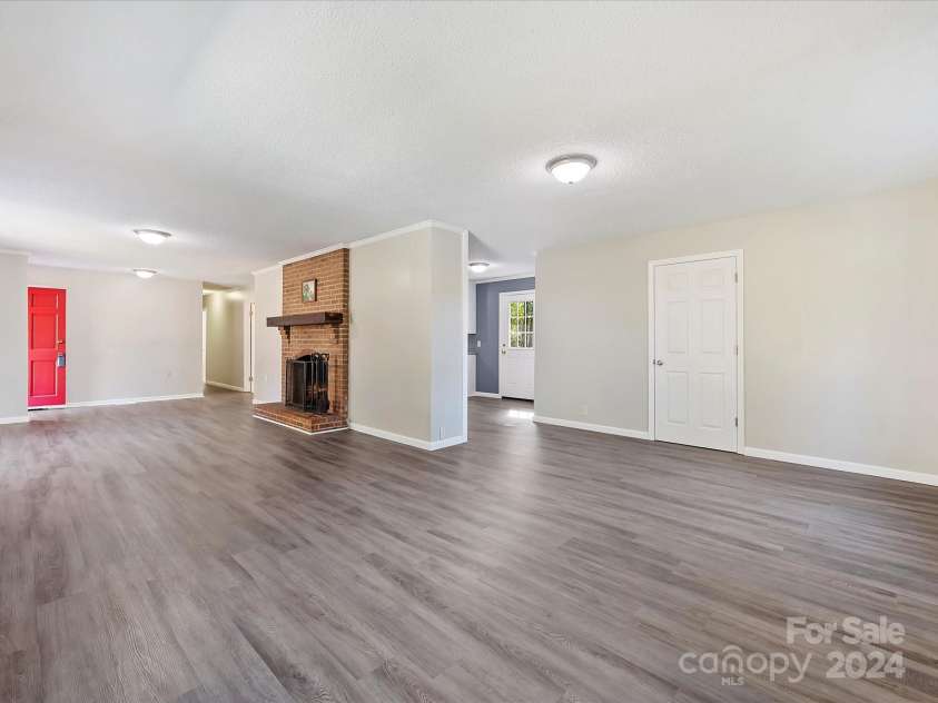111 Bobby Lee Lane, Mooresville, NC 28115.  MLS# CAR4127085, YatesRealty ID 6728. Dining & Living Room