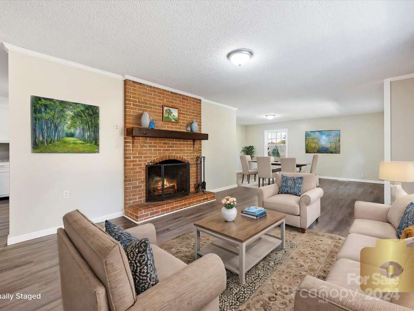 111 Bobby Lee Lane, Mooresville, NC 28115.  MLS# CAR4127085, YatesRealty ID 6728. Living & Dining Room Virtually