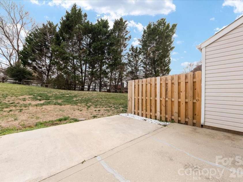 237 Water Oak Drive, Pineville, NC 28134.  MLS# CAR4351240, YatesRealty ID 6728. Back patio