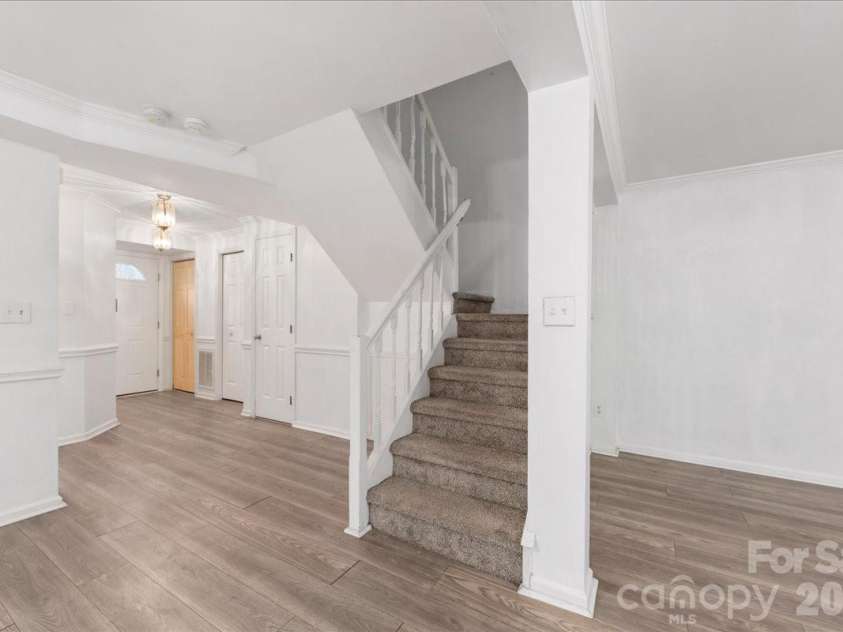 237 Water Oak Drive, Pineville, NC 28134.  MLS# CAR4351240, YatesRealty ID 6728. Stairs to second floor