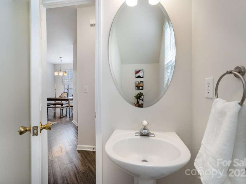 7445 Abigail Glen Drive, Charlotte, NC 28212.  MLS# CAR4242809, YatesRealty ID 6737. Powder Room on main level