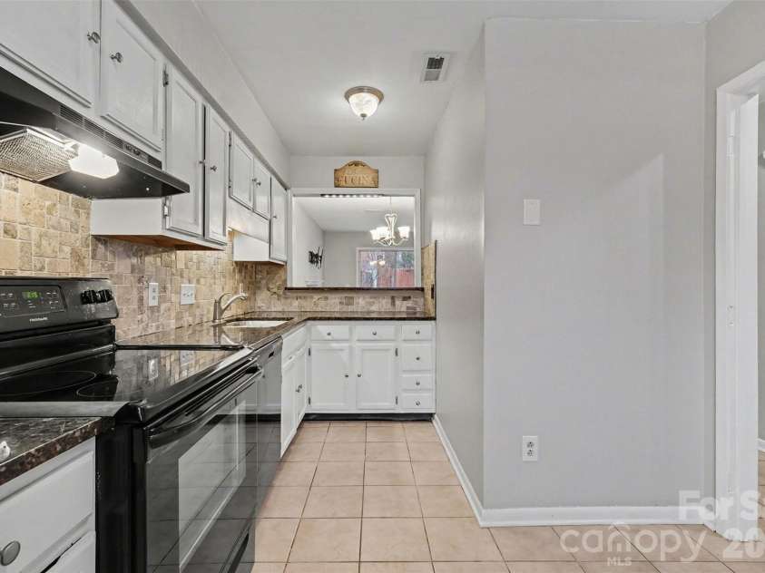 6042 Heath Valley Road, Charlotte, NC 28210.  MLS# CAR4338373, YatesRealty ID 6738. GREAT WORK SPACE AND STORAGE 