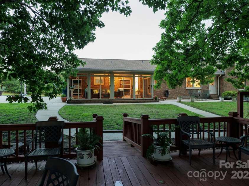 4816 Zion Church Road, Concord, NC 28025.  MLS# CAR4219241, YatesRealty ID 674. View of home from deck in the shade