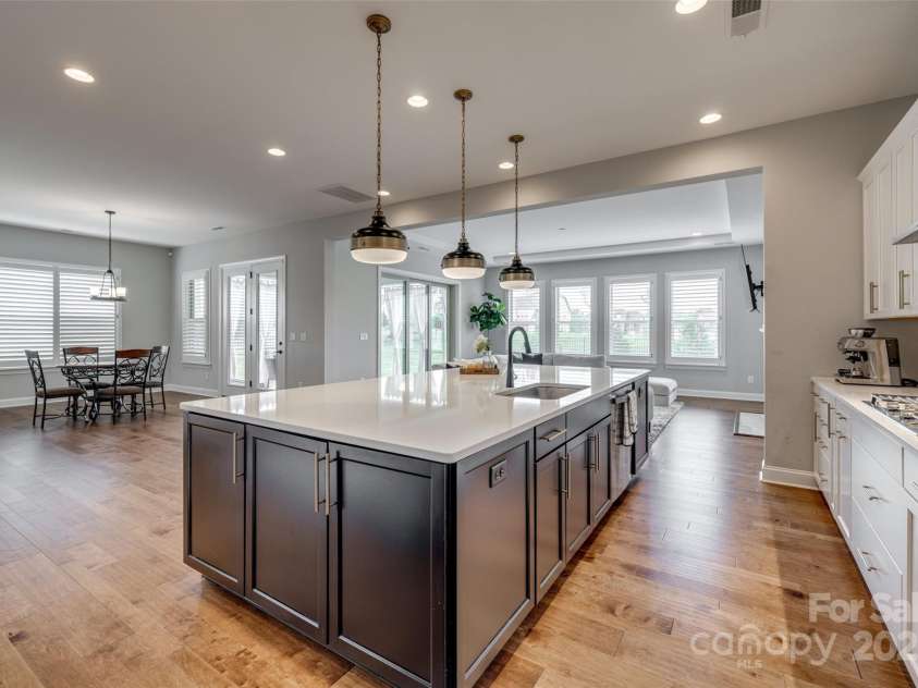 7157 Sumters Camp Trail, Indian Land, SC 29707.  MLS# CAR4245064, YatesRealty ID 6741. Gourmet Kitchen Open to Eating Area and Family Room