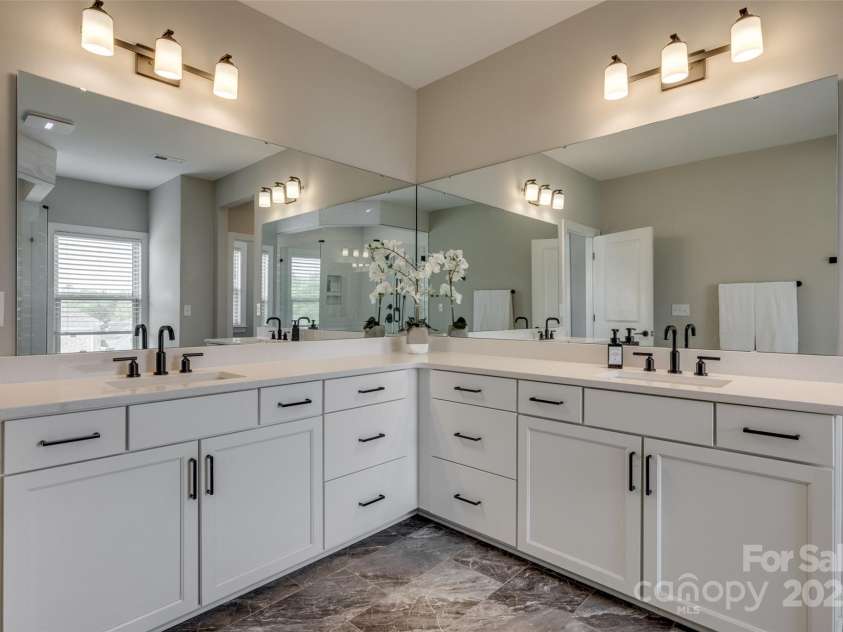 7157 Sumters Camp Trail, Indian Land, SC 29707.  MLS# CAR4245064, YatesRealty ID 6741. Luxury Primary Bathroom with Dual Vanities