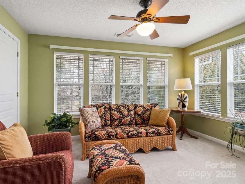 1206 Deermouse Way, Hendersonville, NC 28792.  MLS# CAR4221360, YatesRealty ID 6748. Once a Screened Porch has now been upgraded to an enclosed Bonus Room/Den