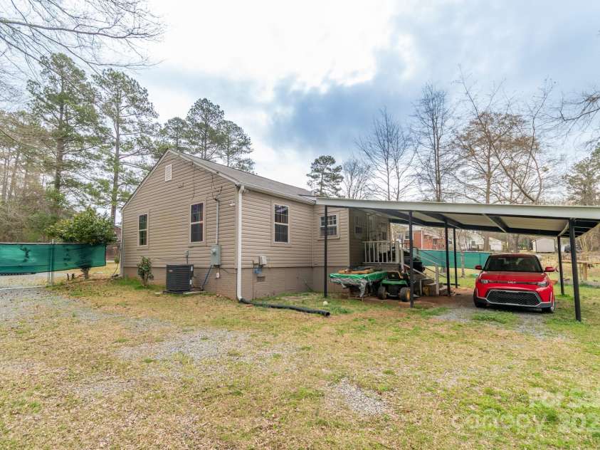 1216 Center Street, Wadesboro, NC 28170.  MLS# CAR4235505, YatesRealty ID 6751. Covered carport parking
