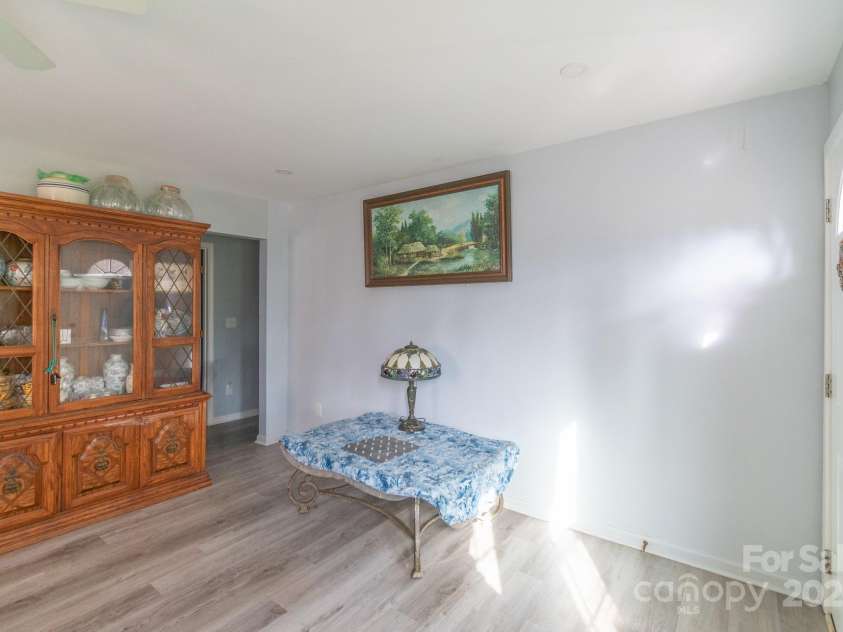 1216 Center Street, Wadesboro, NC 28170.  MLS# CAR4235505, YatesRealty ID 6751. Large living room area that flows to kitchen/dining area