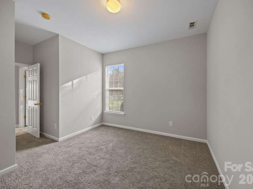 124 Wedge View Way, Statesville, NC 28677.  MLS# CAR4360045, YatesRealty ID 6751. Guest suite on main