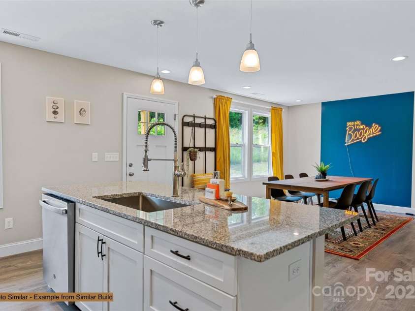 12 Holcombe Road, Candler, NC 28715.  MLS# CAR4245519, YatesRealty ID 6754. 