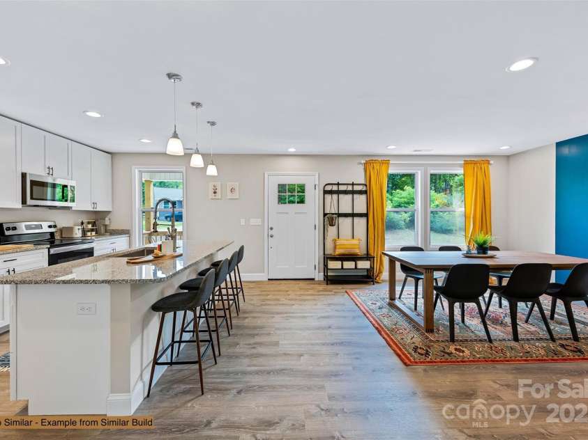 12 Holcombe Road, Candler, NC 28715.  MLS# CAR4245519, YatesRealty ID 6754. 