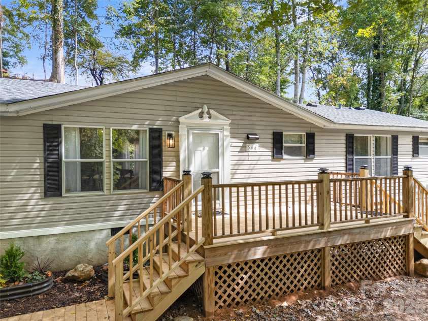25 Overbrook Drive, Saluda, NC 28773.  MLS# CAR4306681, YatesRealty ID 6758. Newly added front deck, walkway and landscaping. 