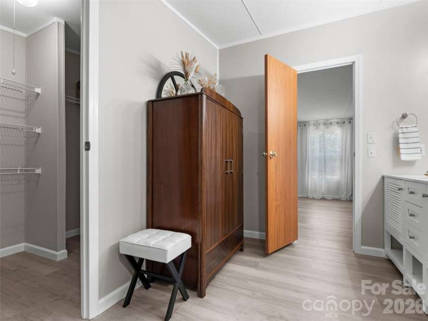 25 Overbrook Drive, Saluda, NC 28773.  MLS# CAR4306681, YatesRealty ID 6758. Primary suite includes huge closet and spacious bathroom. 