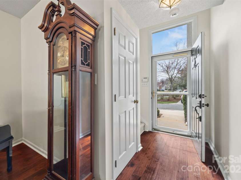8830 Cinnabay Drive, Charlotte, NC 28216.  MLS# CAR4227249, YatesRealty ID 6758. Inviting entryway with storm door