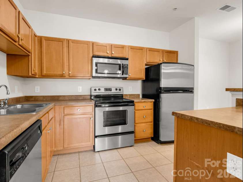 181 Brickton Village Circle, Fletcher, NC 28732.  MLS# CAR4351258, YatesRealty ID 6764. Kitchen includes all appliances